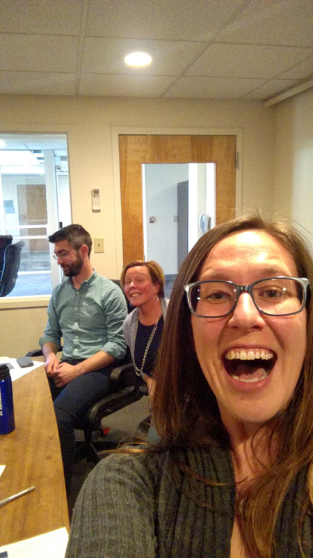 Sarah Cochran taking a selfie with Mike Trombley and Susan Rent of the ID team.