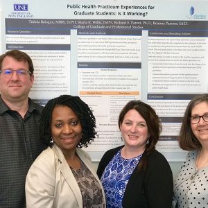 CGPS Staff Faculty with with the poster results of their CETL mini-grant-funded research project