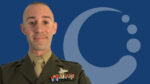 Kenneth Palmer, MSW student, stands in his Navy Uniform