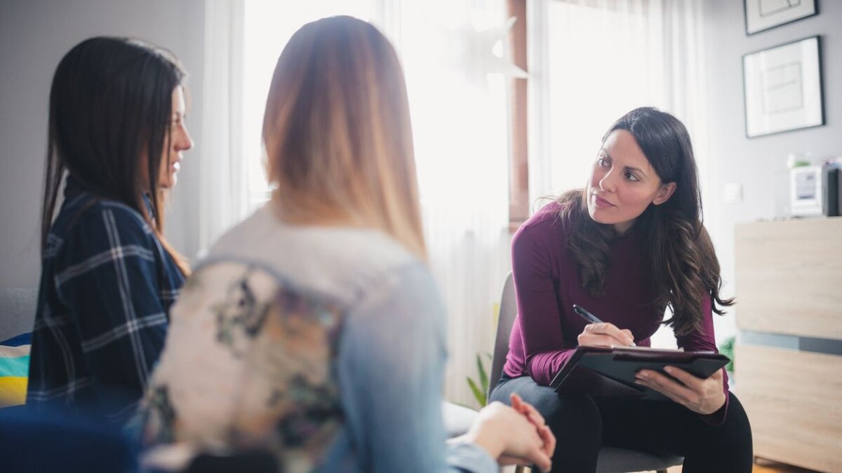 Counselor advising teens
