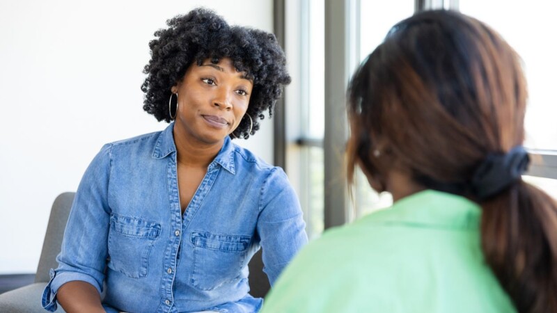 African American woman therapist in counseling session